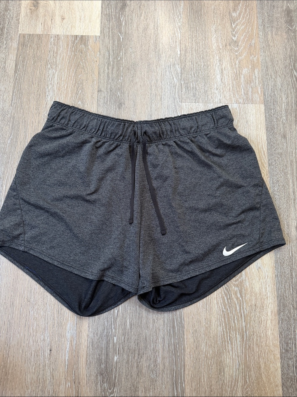 Nike Women's Charcoal Gray Athletic Shorts with White Swoosh